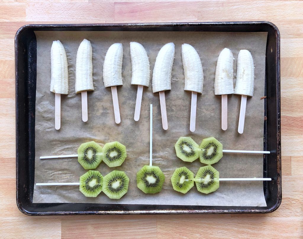 Frozen fruit cocktail stir sticks